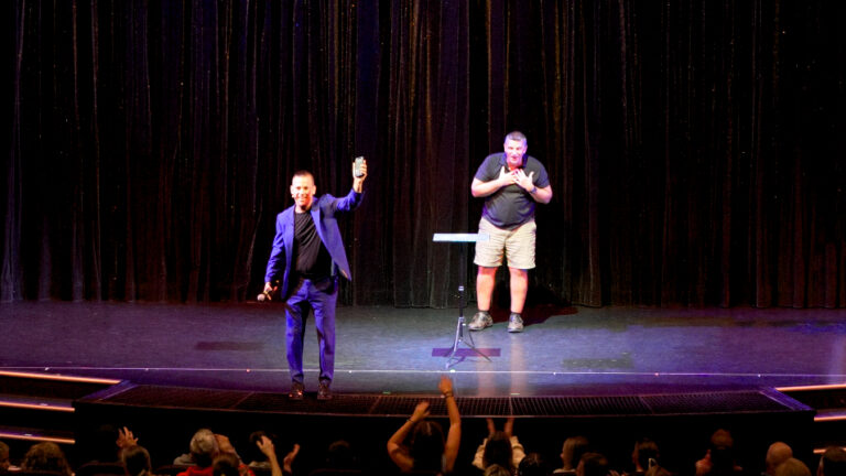 David Hall performing his mind reading show live on stage with audience volunteers.