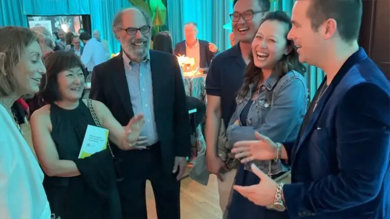 oving magician Boston—David Hall amazes guests with close-up magic at a private event.